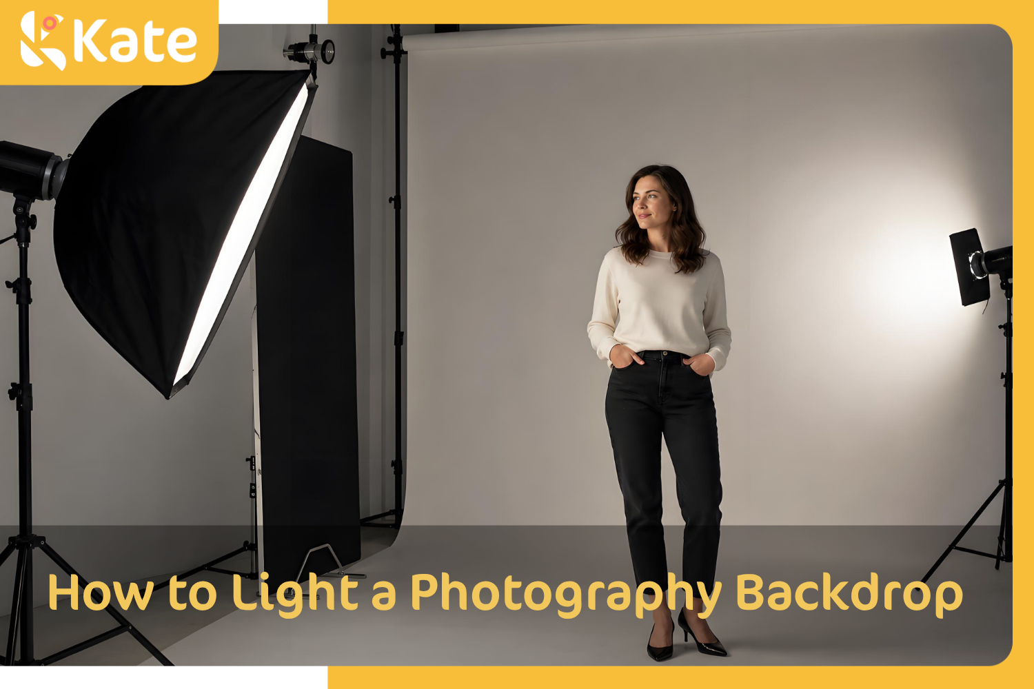 Small photography studio with a model, softbox, backdrop light, and black flag for portrait lighting