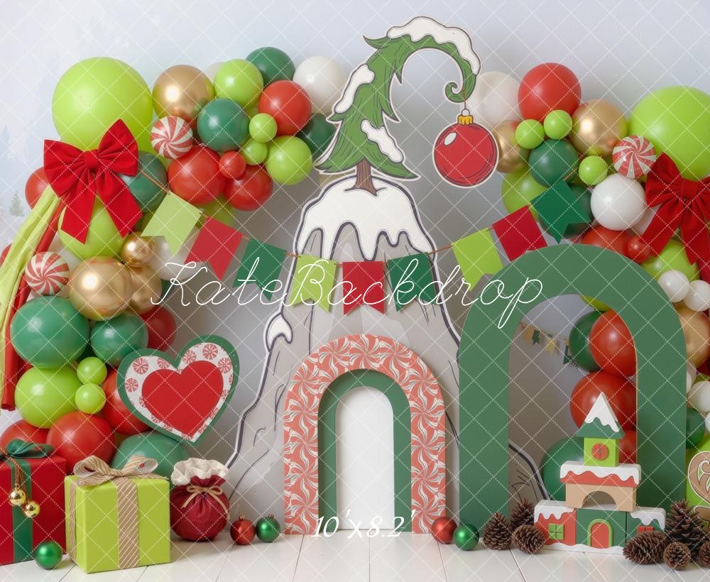 Kate Christmas Cake Smash Whoville Balloon Arch Candy Cane Gifts Green Red Printed Backdrop Designed by Mini MakeBelieve