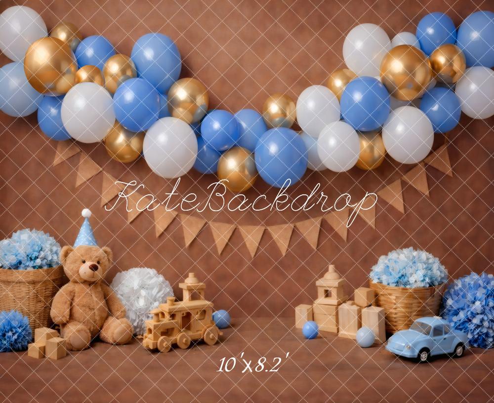 Kate Cake Smash Blue Gold Balloon Garland Teddy Bear Toy Car Brown Printed Backdrop Designed by Vertigo Productions