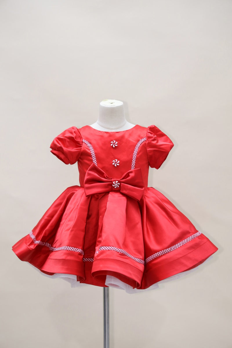 Vestido de niños escalonado en tonos rosados y morados para fotografía