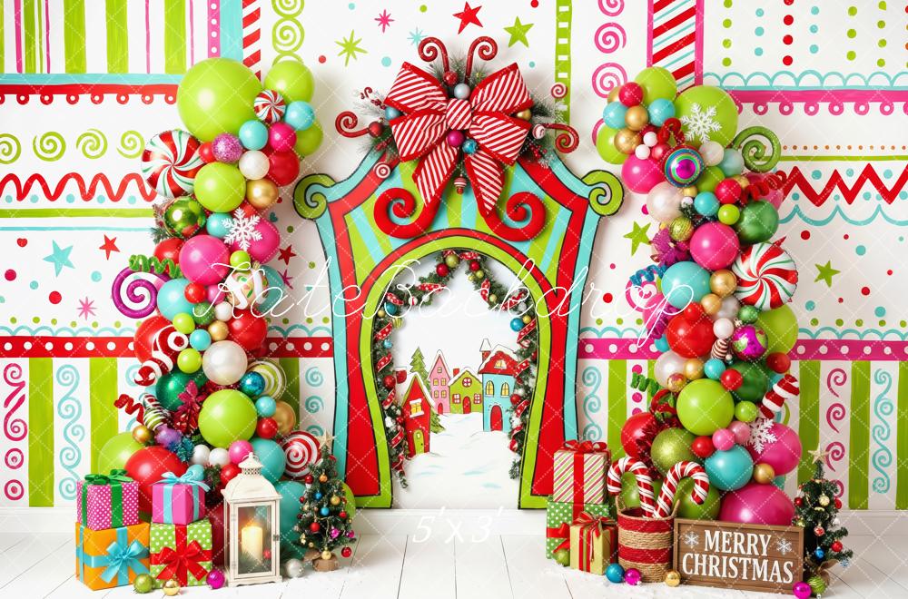Kate Christmas Cake Smash Whimsical Candyland Balloon Arch Presents Printed Backdrop Designed by Patty Roberts