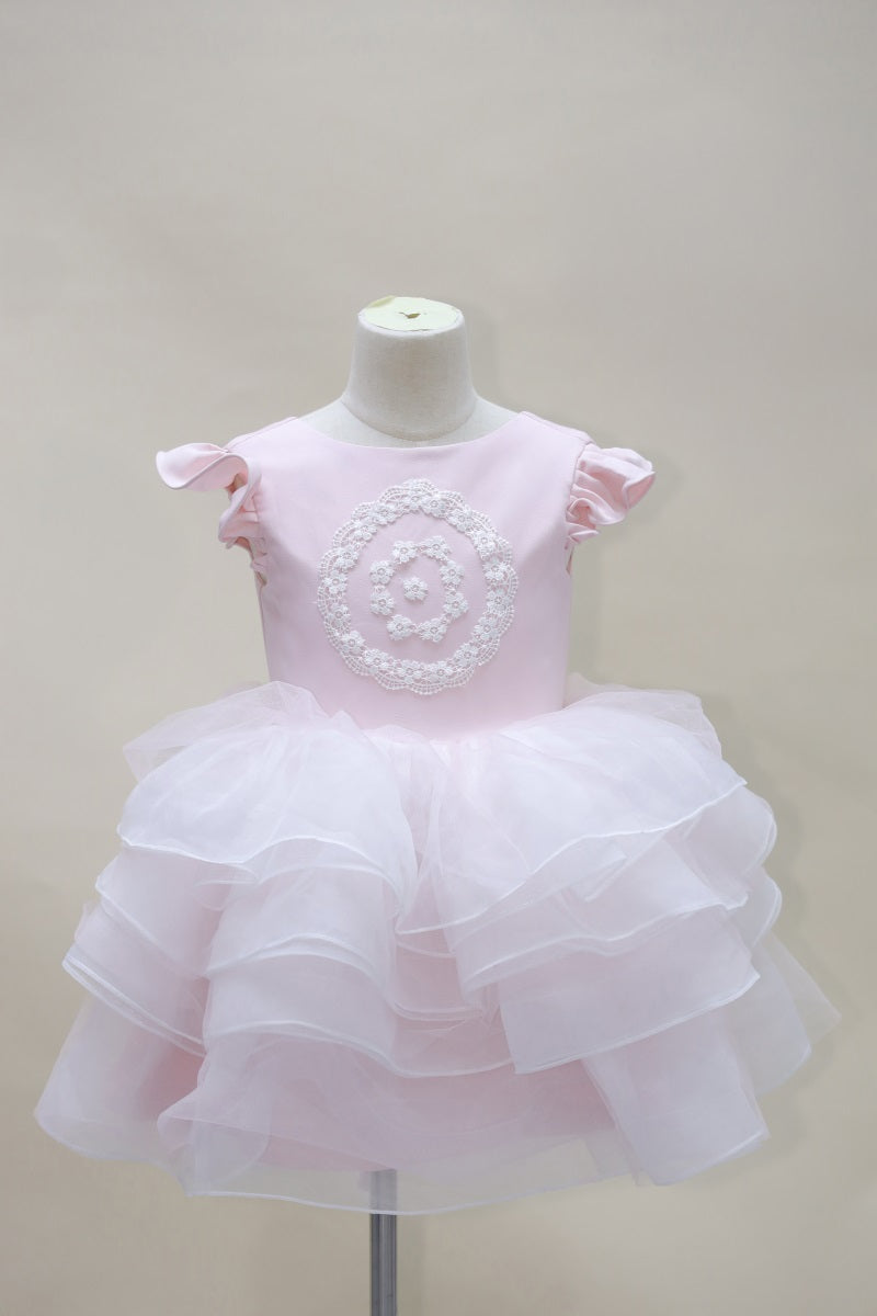 Vestido de niños escalonado en tonos rosados y morados para fotografía