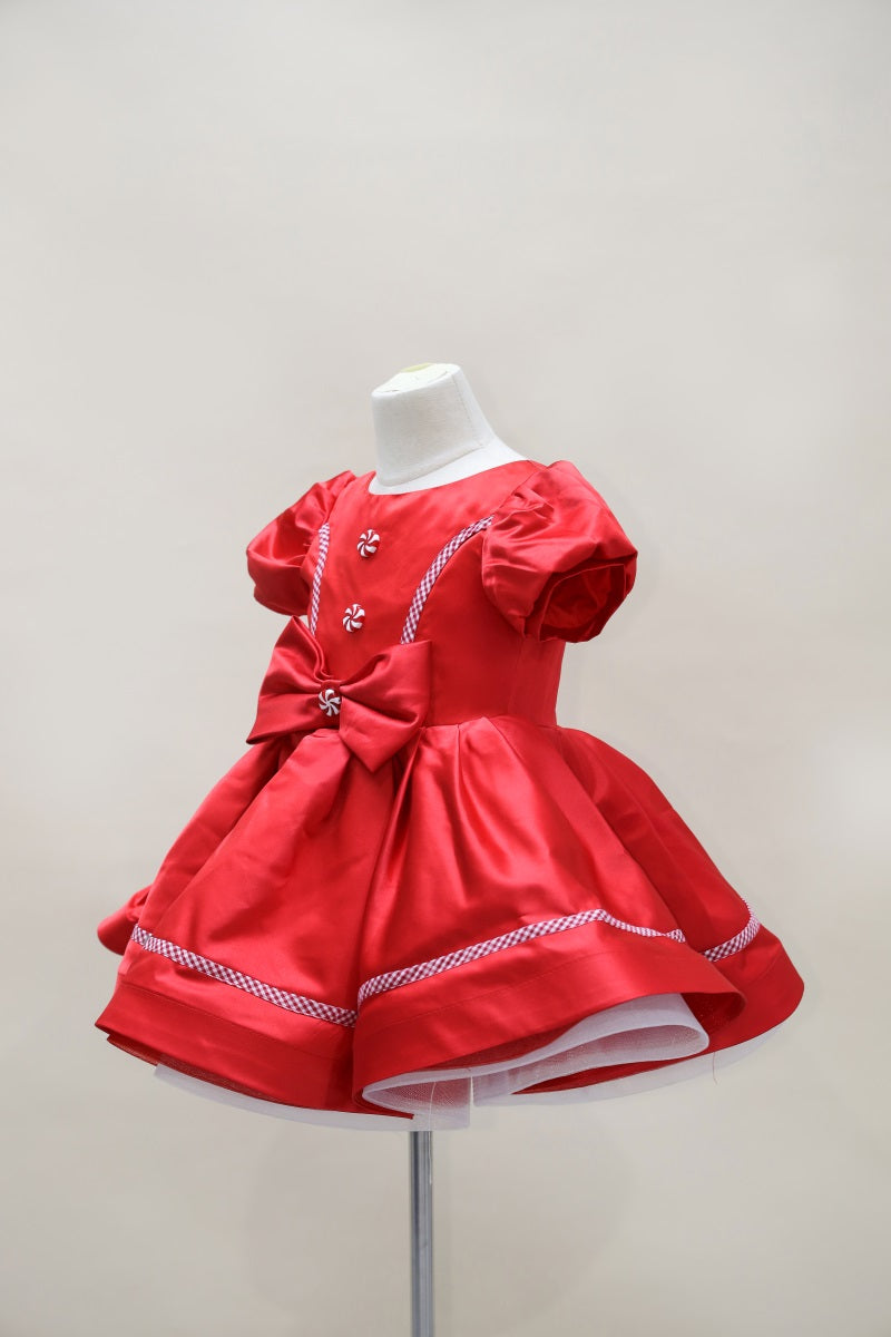 Vestido de niños escalonado en tonos rosados y morados para fotografía
