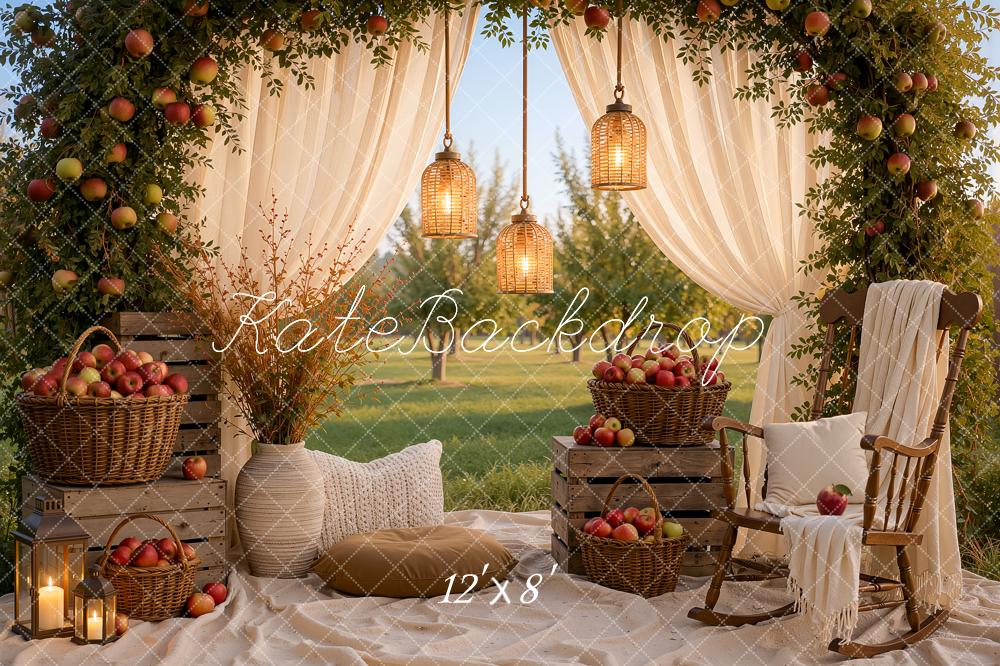 Kate Fall Picnic Apple Arch White Drapes Cozy Chair Baskets Crates Lanterns Printed Backdrop Designed by Ashley Ward