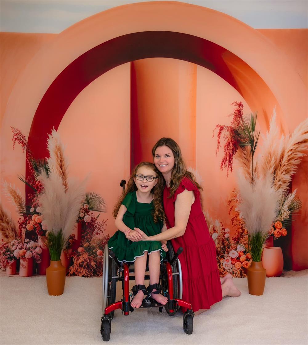 Telón de fondo arco de flores boho naranja diseñado por Emetselch.