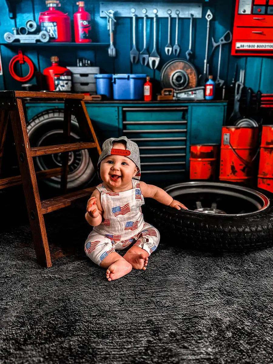 Kate Modern Tool Holder and Tires Red Tanker Garage Printed Backdrop Designed by Emetselch