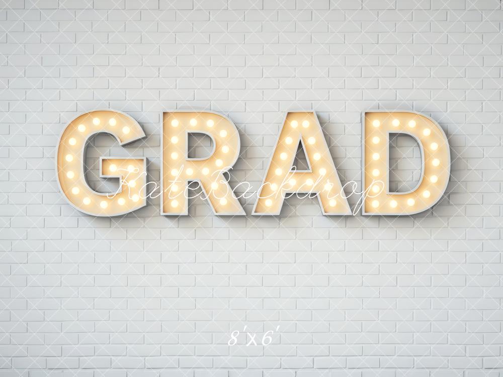 Kate Graduation Grad Marquee Letters White Brick Wall Printed Backdrop Designed by Mini MakeBelieve