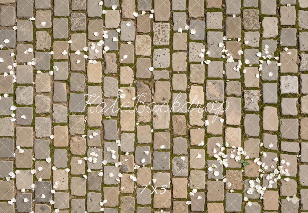 Kate Cobblestone Floor With White Petals Printed Backdrop Designed by Kate Image