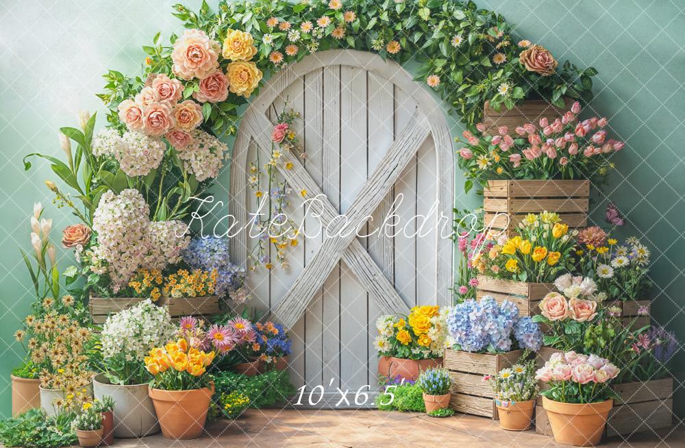 Kate Spring Flower Arch White Door Wooden Crates Pastel Green Backdrop Designed by Emetselch