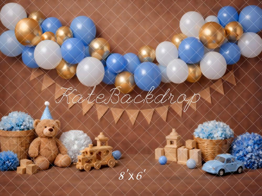 Kate Cake Smash Blue Gold Balloon Garland Teddy Bear Toy Car Brown Printed Backdrop Designed by Vertigo Productions