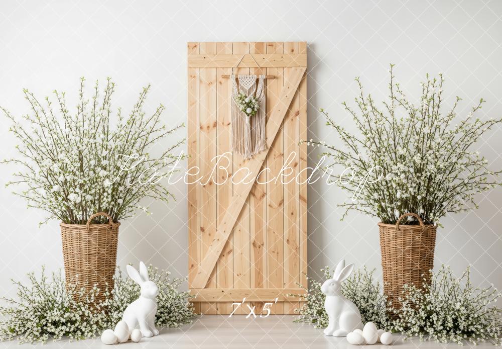 Kate Easter Bunny Wooden Door Wicker Baskets White Flowers Backdrop Designed by Patty Roberts