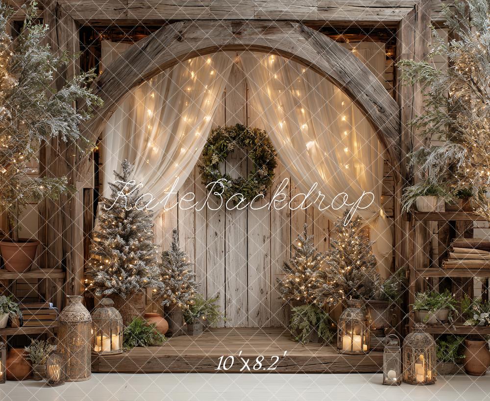 Kate Christmas Rustic Wood Arch Wreath String Lights Lanterns Trees Backdrop Designed by Ashley Paul