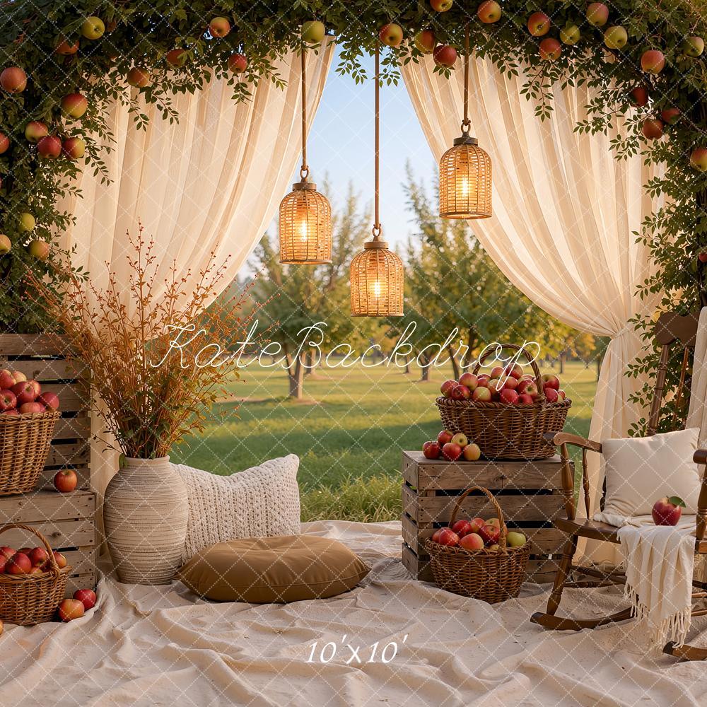 Kate Fall Picnic Apple Arch White Drapes Cozy Chair Baskets Crates Lanterns Printed Backdrop Designed by Ashley Ward