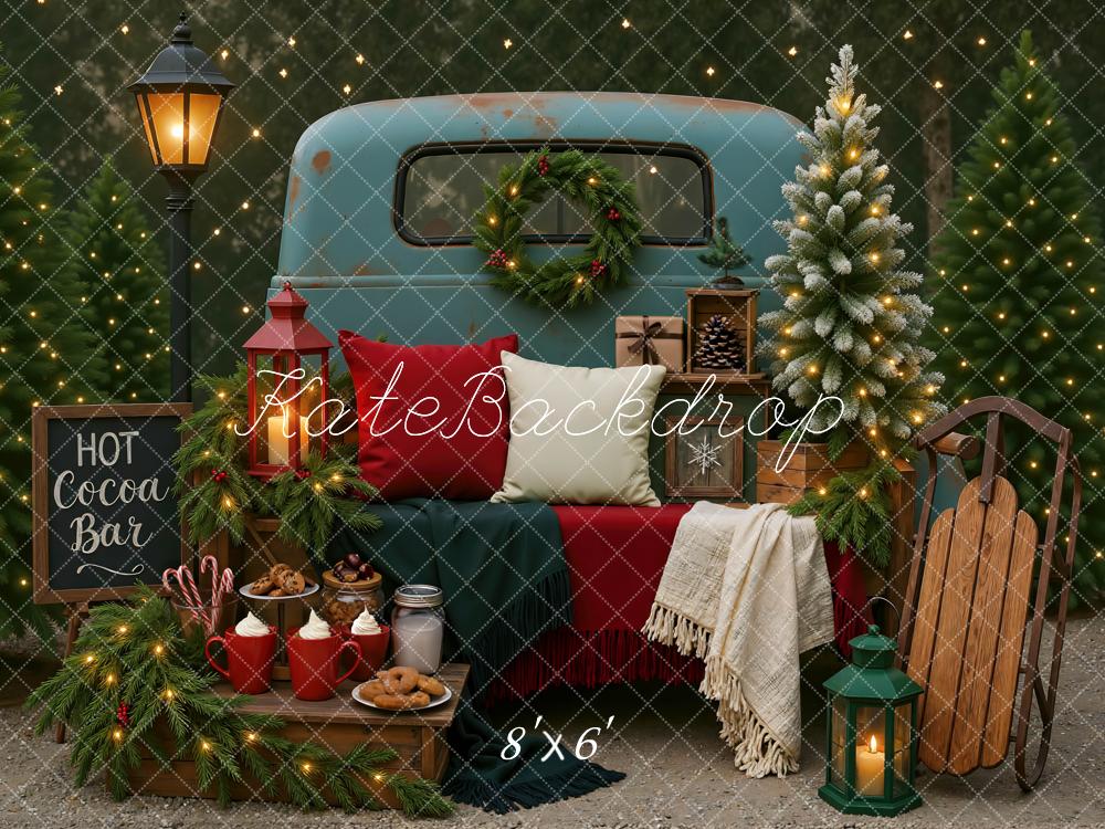 Kate Christmas Truck Hot Cocoa Bar Trees Lantern Sled Backdrop Designed by Mini MakeBelieve