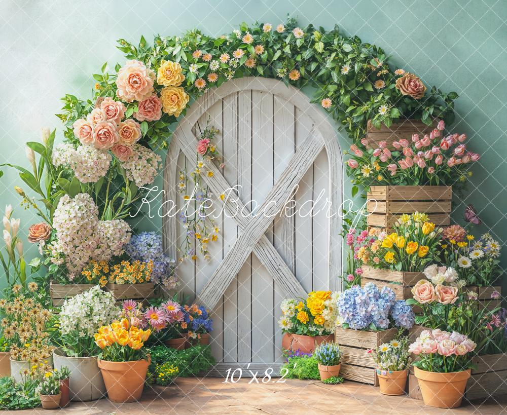 Kate Spring Flower Arch White Door Wooden Crates Pastel Green Backdrop Designed by Emetselch