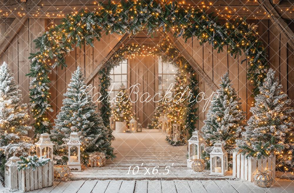 Kate Christmas Barn Garland Arch Snowy Pine Trees Lanterns Rustic Backdrop Designed by Emetselch