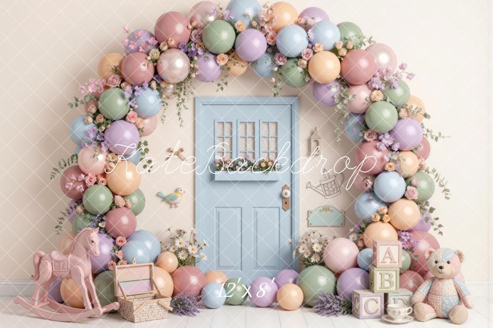 Kate Spring Birthday Pastel Balloon Flower Arch Blue Door Rocking Horse Teddy Bear Printed Backdrop Designed by Mini MakeBelieve