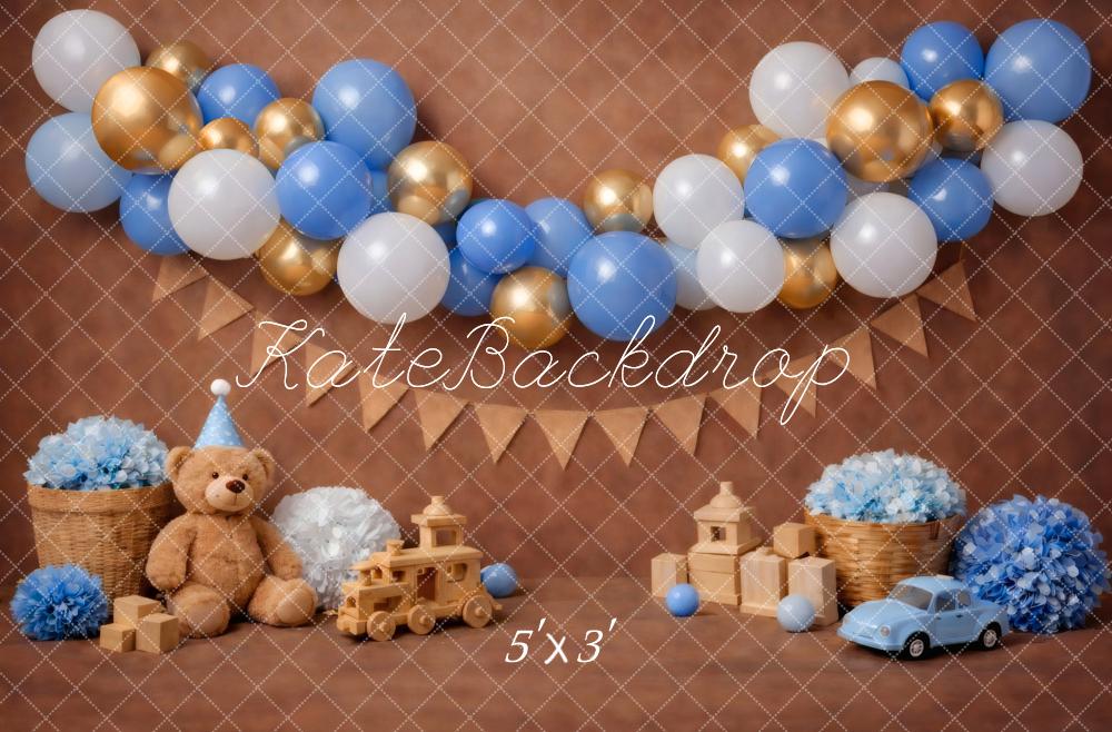 Kate Cake Smash Blue Gold Balloon Garland Teddy Bear Toy Car Brown Printed Backdrop Designed by Vertigo Productions