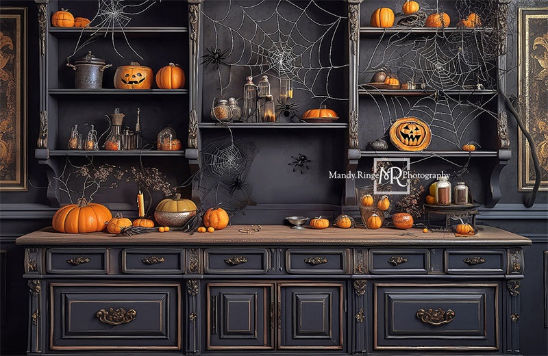 Kate Spooky Kitchen with Spiderwebs and Pumpkin Backdrop Designed by Mandy Ringe Photography