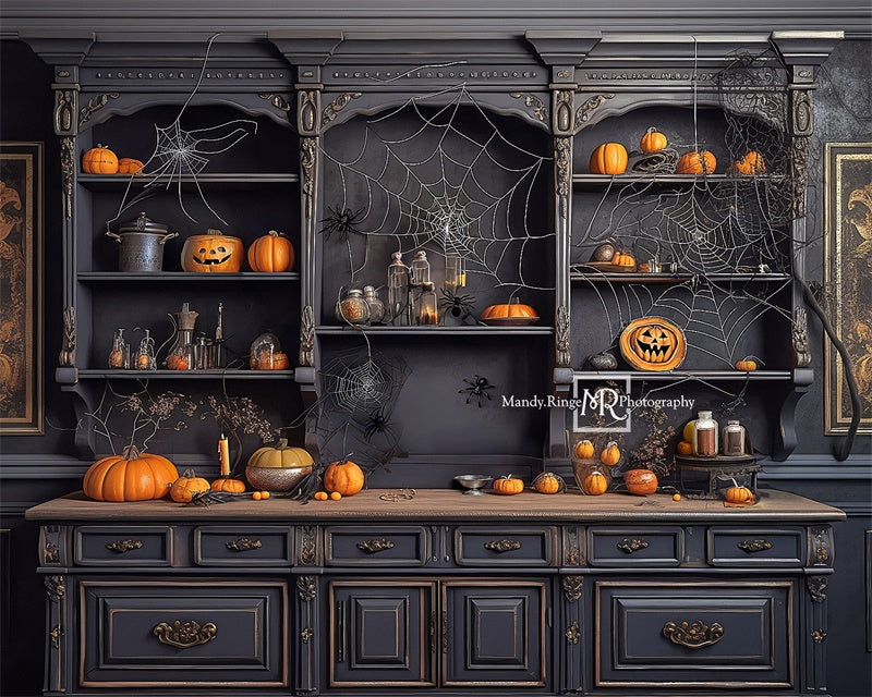 Kate Spooky Kitchen with Spiderwebs and Pumpkin Backdrop Designed by Mandy Ringe Photography