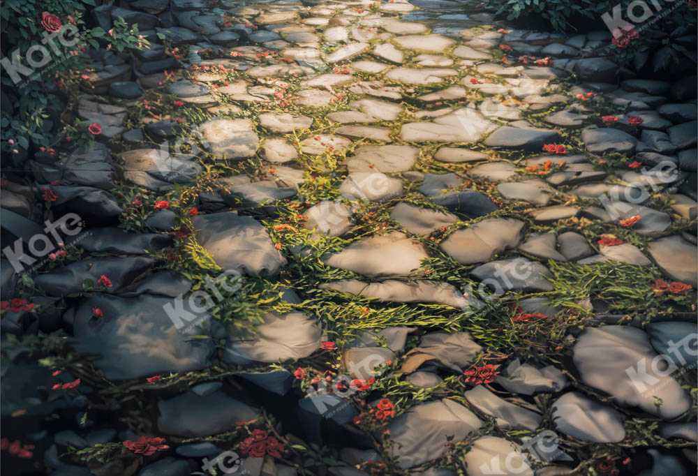 Tappeto di erba primaverile su pavimento in pietra progettato da Kate Immagine.