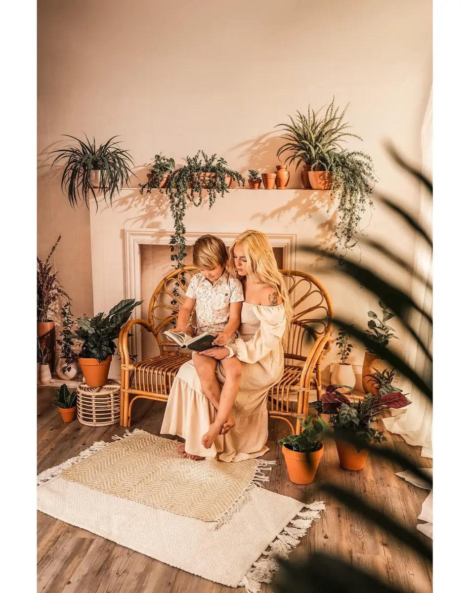 Kate White Fireplace With Spring Greenery Backdrop Designed by Emetselch