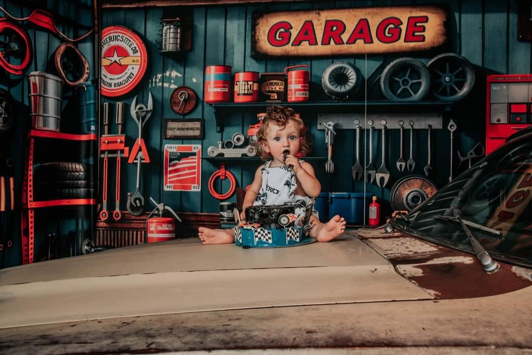 Kate Modern Tool Holder and Tires Red Tanker Garage Printed Backdrop Designed by Emetselch