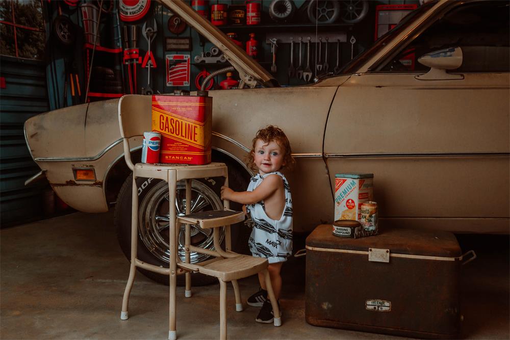Kate Modern Tool Holder and Tires Red Tanker Garage Printed Backdrop Designed by Emetselch
