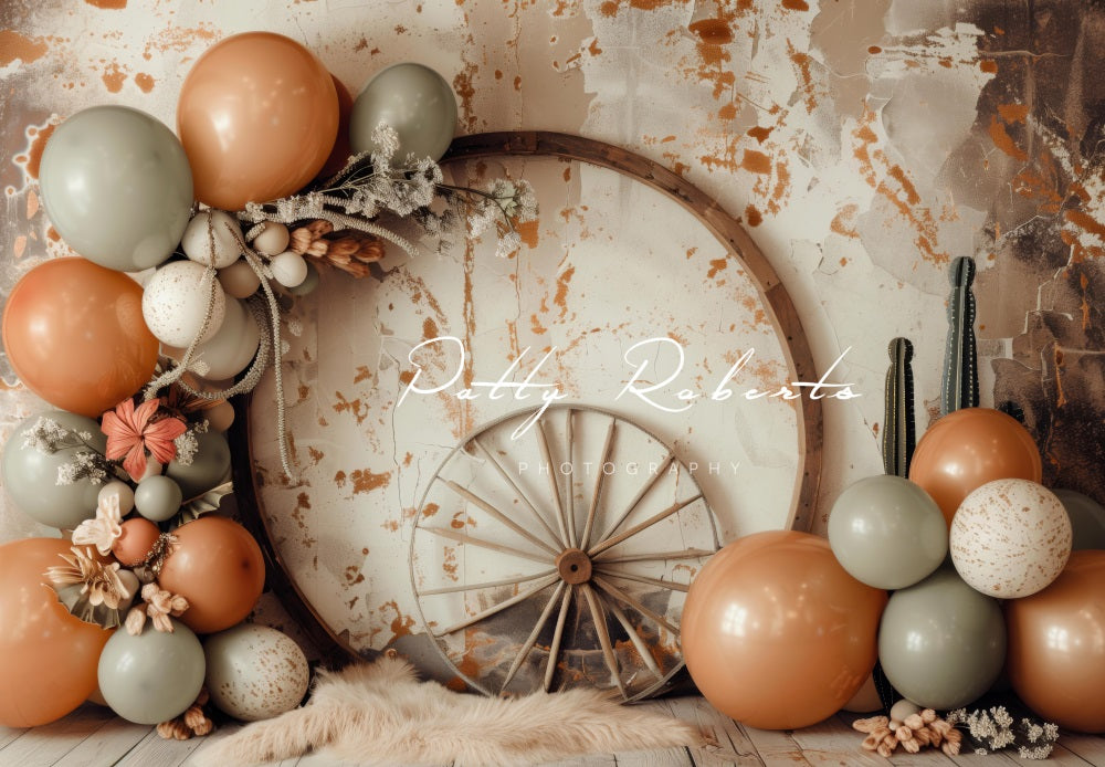 Kate Boho Wild West Colorful Balloon Brown Circle Wooden Wheel White Broken Wall Backdrop Designed by Patty Robert