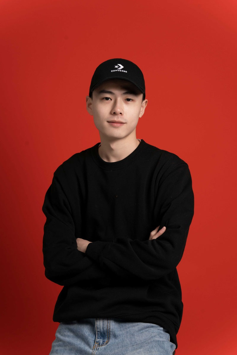 Kate Red Seamless Paper Backdrop with a man