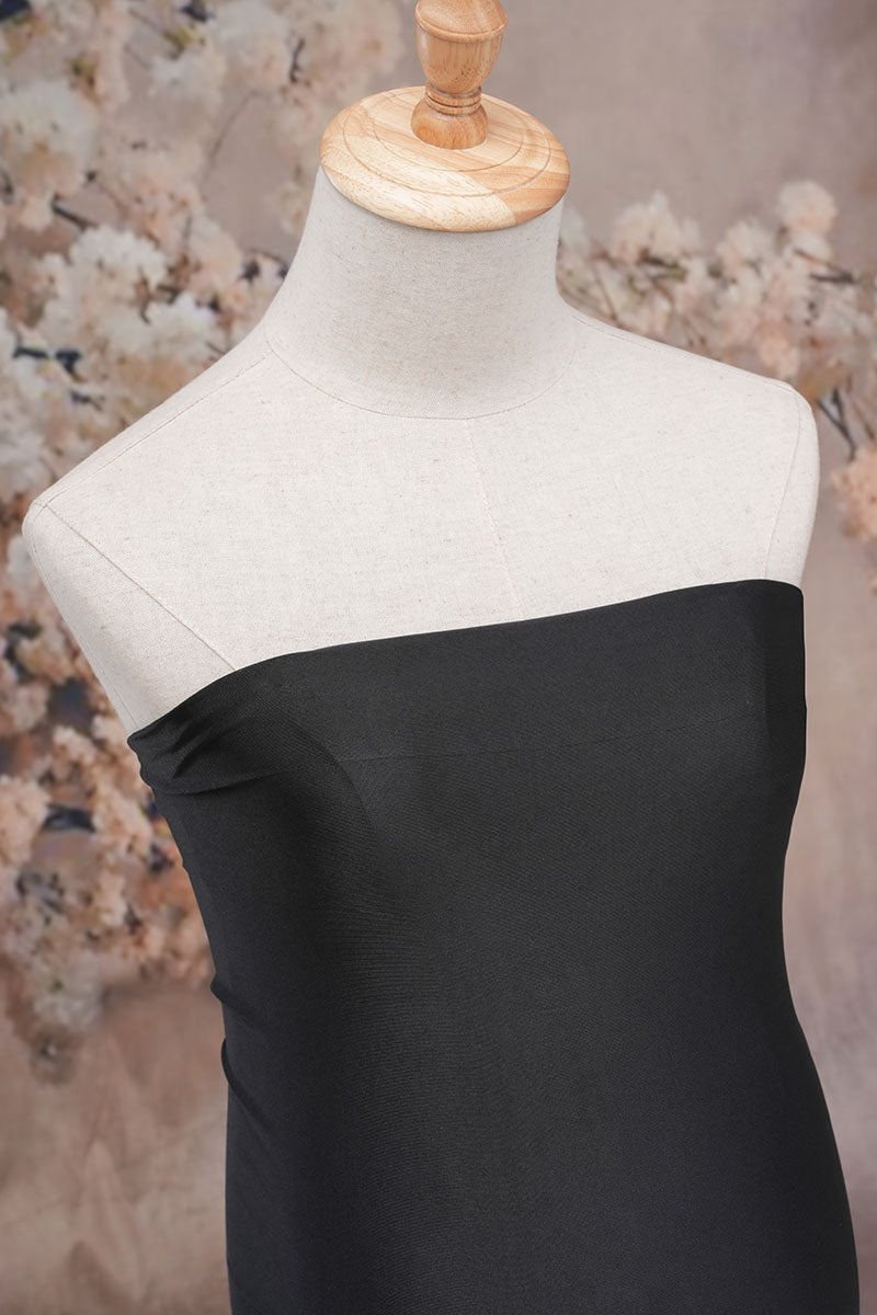 Black one-shoulder satin maternity dress front detail photo