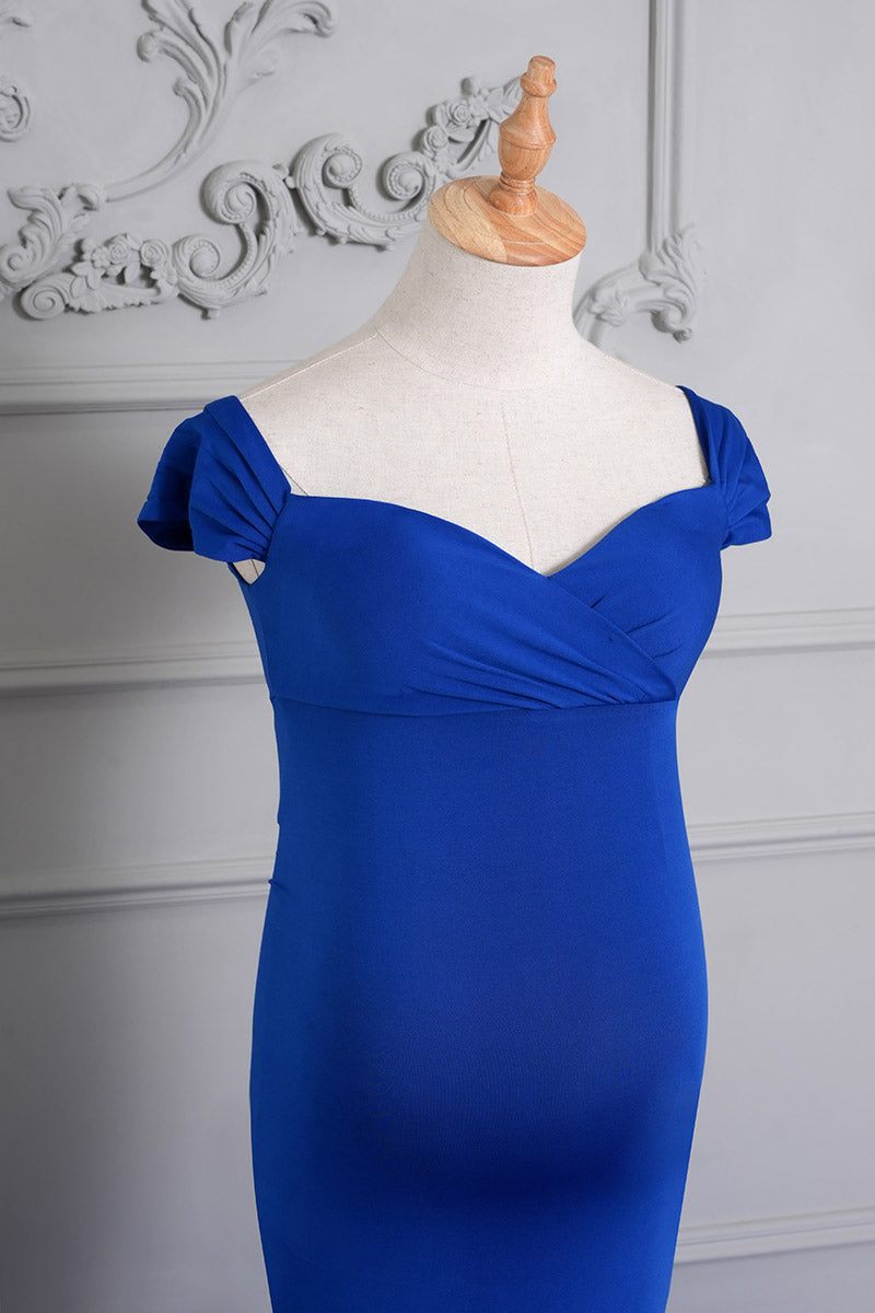 Detail shot of the front of a blue one-shoulder satin maternity dress