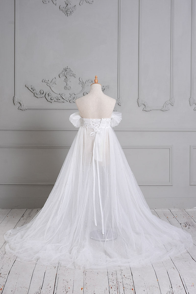 Back view of white sheath mesh maternity dress