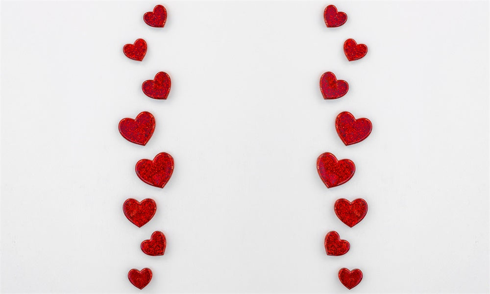 Tappetino in gomma a forma di cuore rosso progettato da Mini MakeBelieve