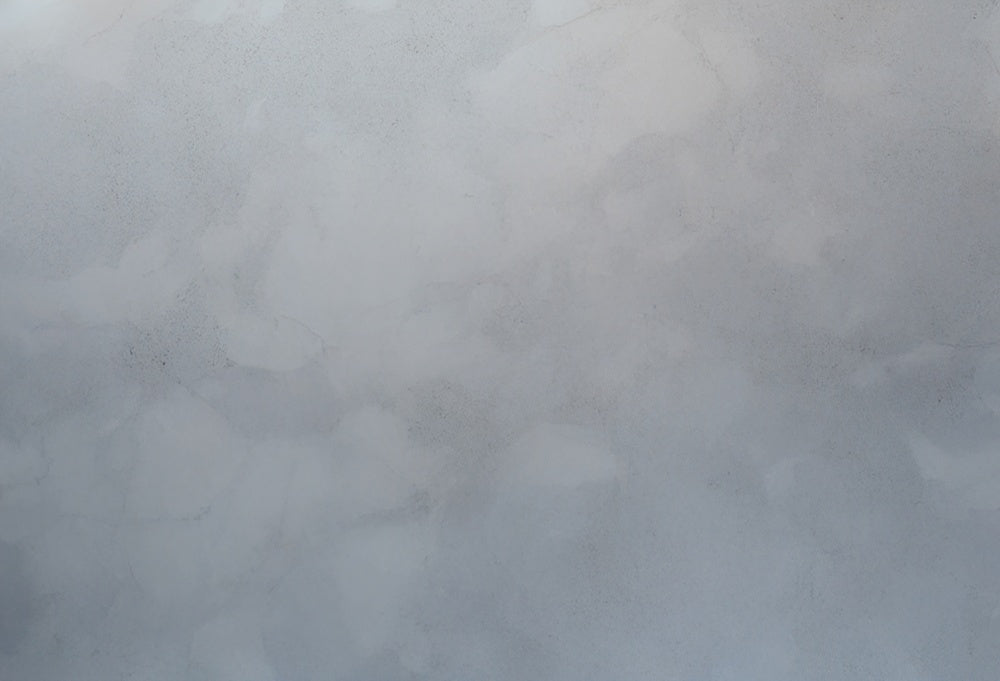 Tappeto in gomma grigia con texture astratta progettato da Mini MakeBelieve