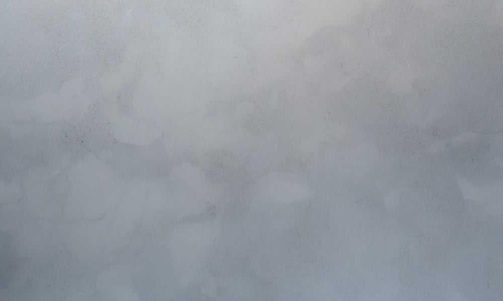 Tappeto in gomma grigia con texture astratta progettato da Mini MakeBelieve