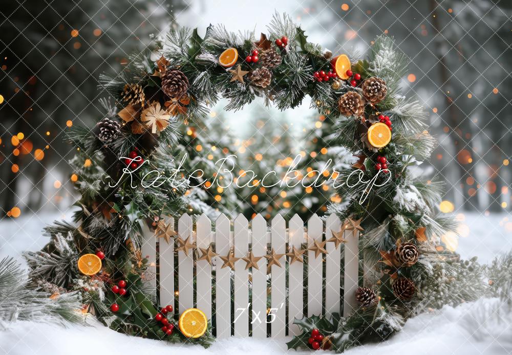 Kate Christmas Arch Winter Snowy Fence Oranges Backdrop Designed by Mini MakeBelieve