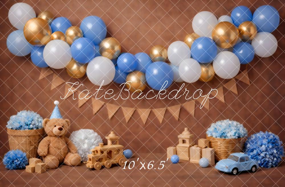 Kate Cake Smash Blue Gold Balloon Garland Teddy Bear Toy Car Brown Printed Backdrop Designed by Vertigo Productions