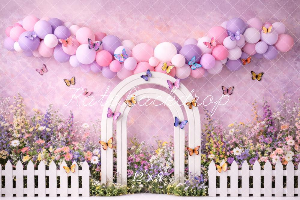 Kate Spring Flower Arch Pastel Balloons Butterflies White Fence Printed Backdrop Designed by Megan Leigh Photography