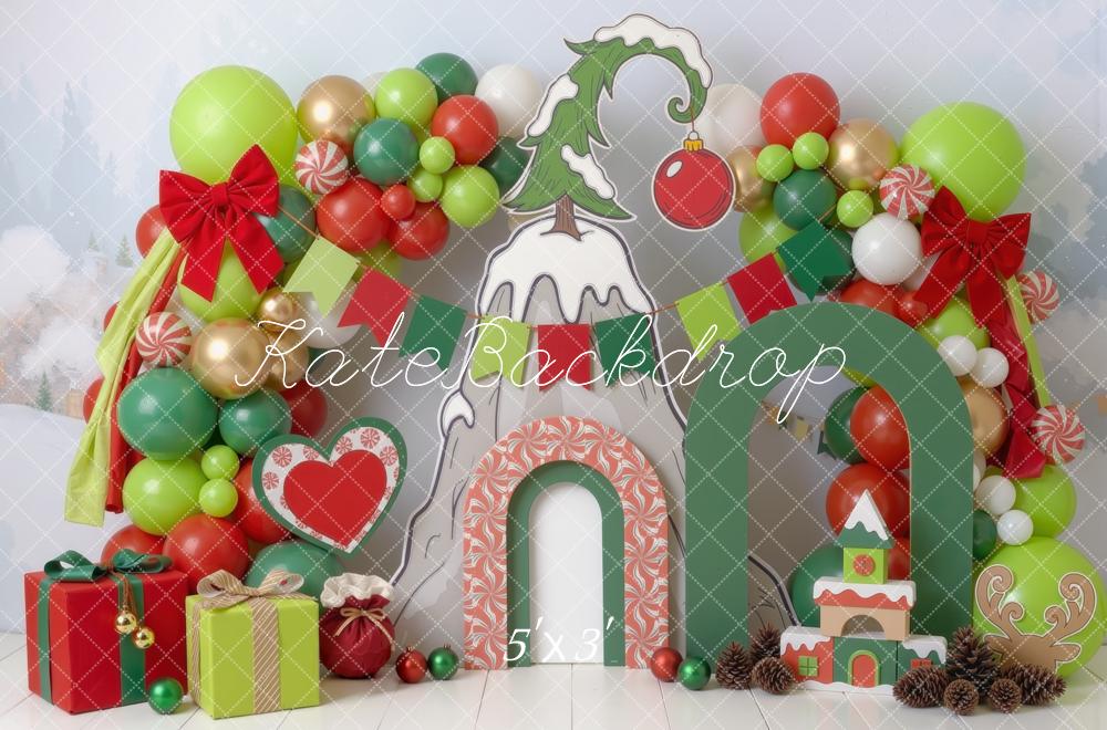 Kate Christmas Cake Smash Whoville Balloon Arch Candy Cane Gifts Green Red Printed Backdrop Designed by Mini MakeBelieve