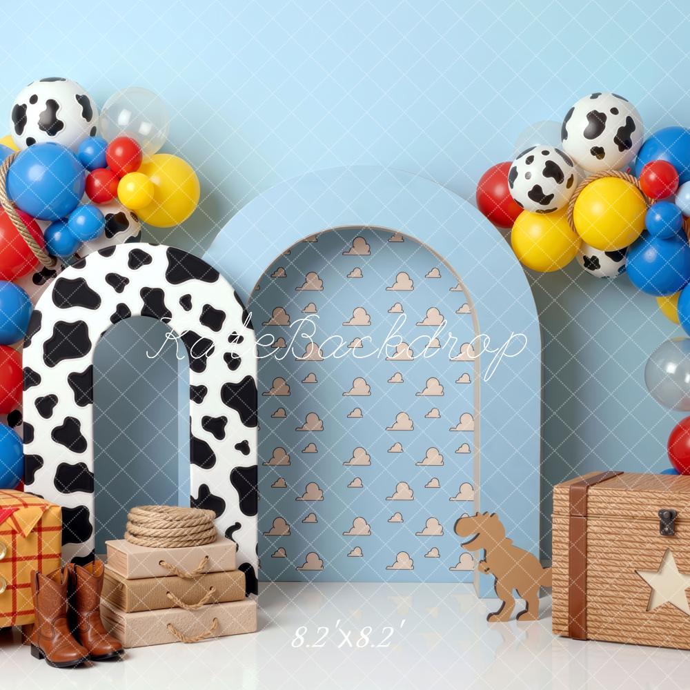 Kate Birthday Cowboy Cow Print Arch Balloons Toy Chest Blue Clouds Printed Backdrop Printed Backdrop Designed by Mini MakeBelieve