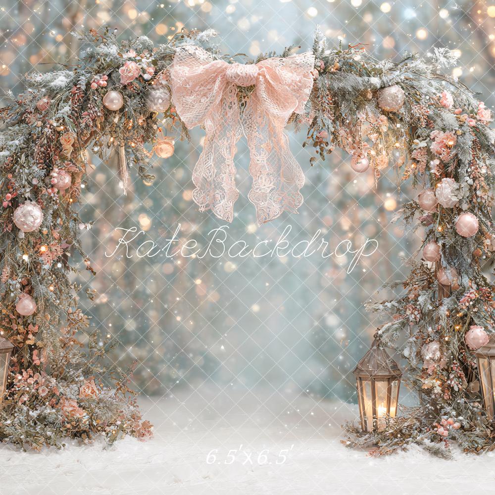 Kate Christmas Arch Pink Bow Lanterns Snowy Forest Backdrop Designed by Ashley Paul