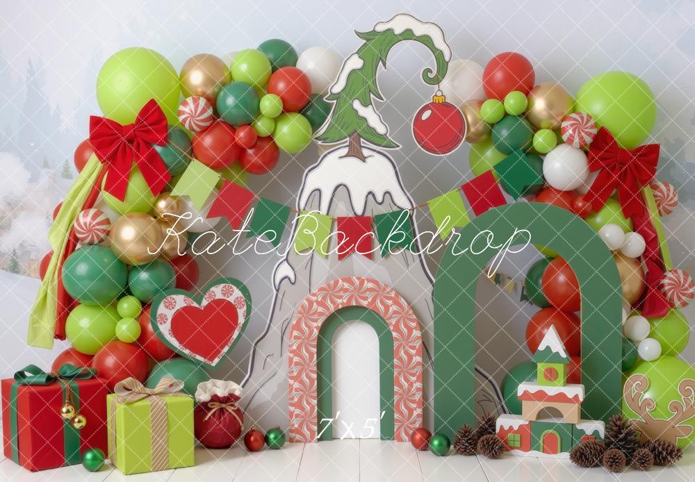 Kate Christmas Cake Smash Whoville Balloon Arch Candy Cane Gifts Green Red Printed Backdrop Designed by Mini MakeBelieve