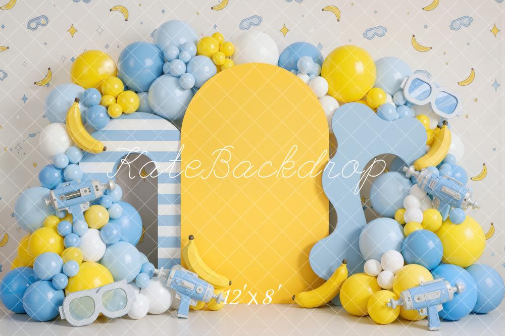 Kate Cake Smash Playful Banana Goggles Balloon Arch Yellow Blue Printed Backdrop Designed by Mini MakeBelieve