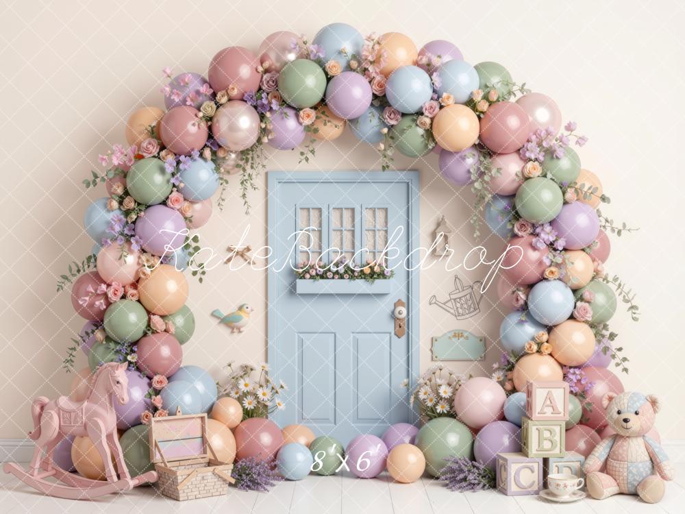Kate Spring Birthday Pastel Balloon Flower Arch Blue Door Rocking Horse Teddy Bear Printed Backdrop Designed by Mini MakeBelieve