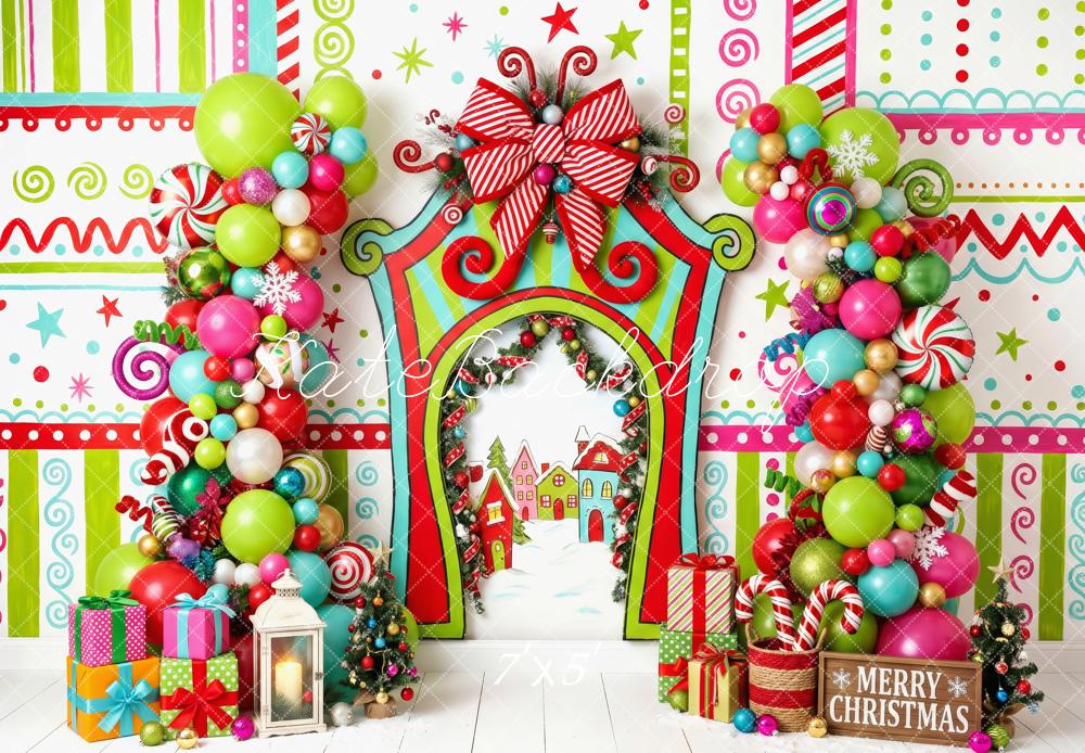 Kate Christmas Cake Smash Whimsical Candyland Balloon Arch Presents Printed Backdrop Designed by Patty Roberts