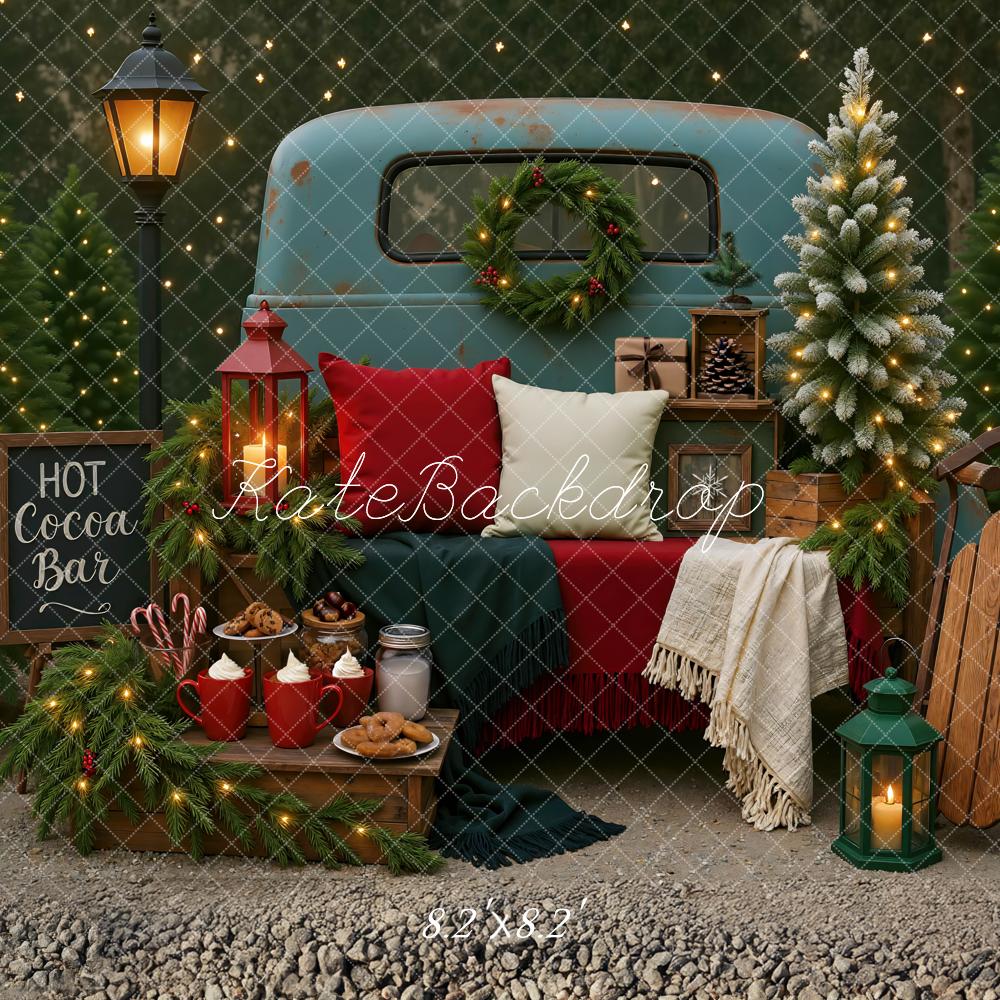 Kate Christmas Truck Hot Cocoa Bar Trees Lantern Sled Backdrop Designed by Mini MakeBelieve