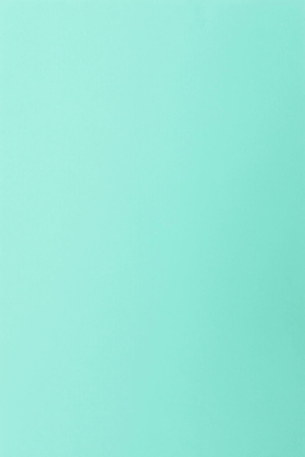 Solide lichtblauwe stoffen achtergrond voor portretfotografie