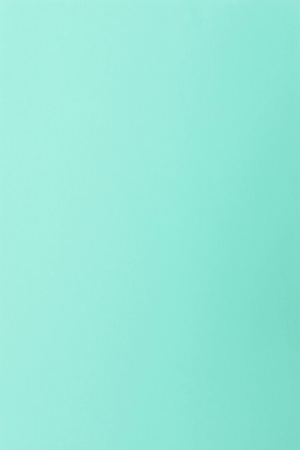 Solide lichtblauwe stoffen achtergrond voor portretfotografie