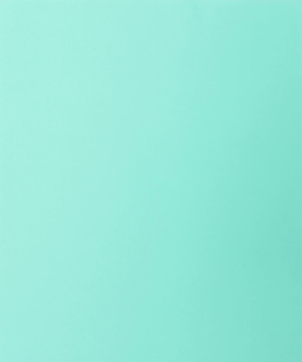 Solide lichtblauwe stoffen achtergrond voor portretfotografie